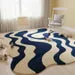 Wavy Modern Blue & Cream Area Rug – Handcrafted Abstract Curved Rug